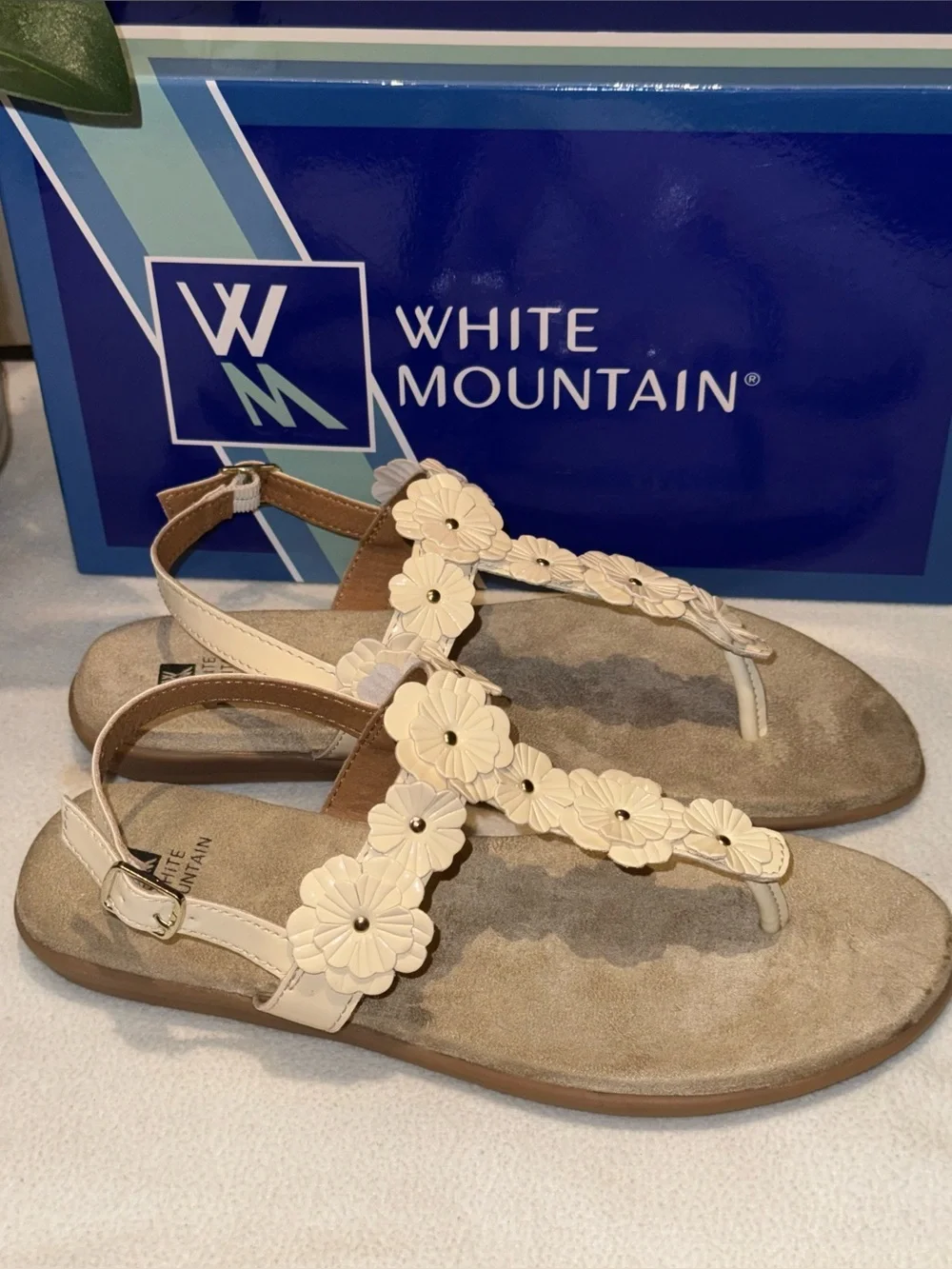 White Mountain Liftoff Flat Sandals feature delicate floral applique on T-strap
